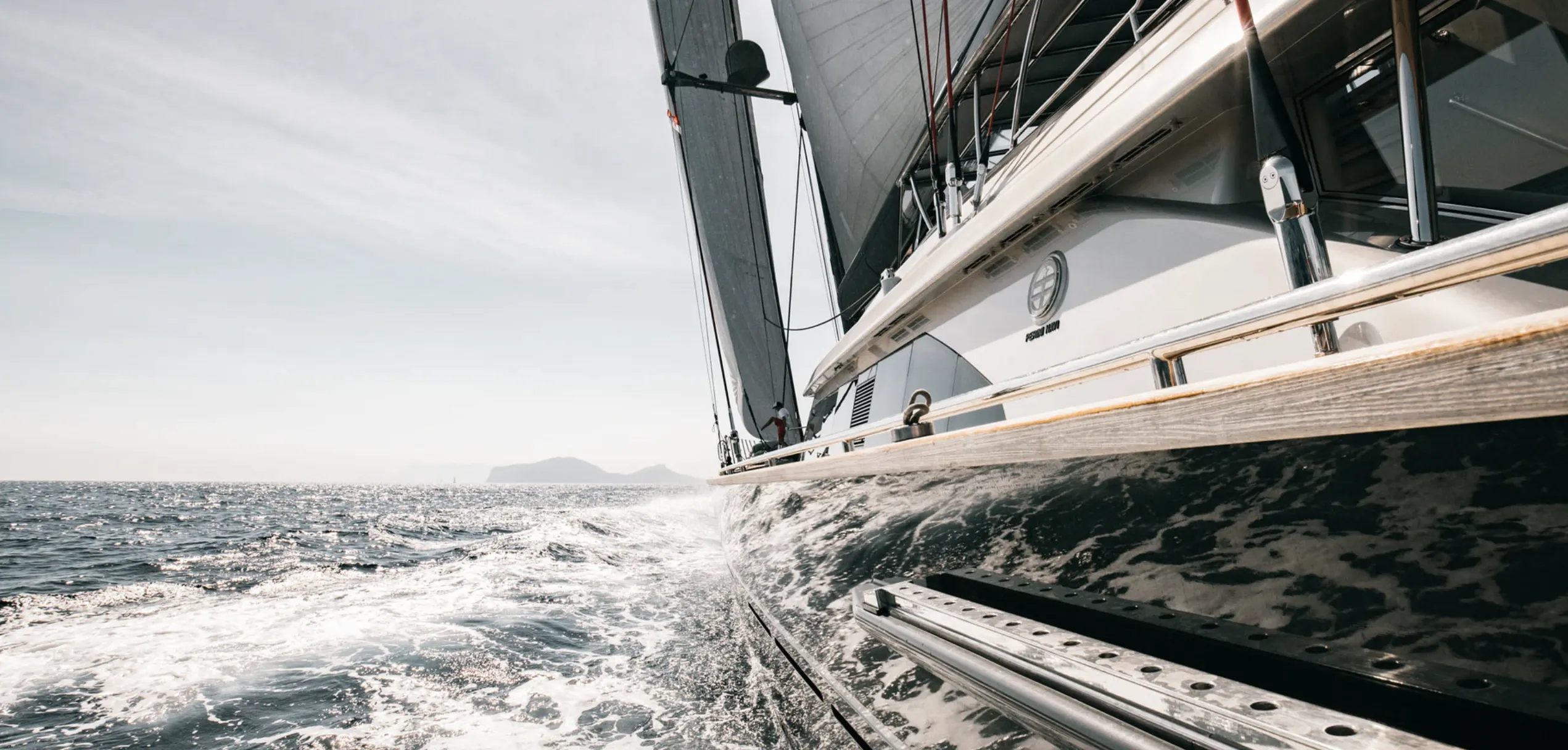 Side view of a sailing boat equipped with Victron Energy solar battery system and inverter for marine energy storage solutions by 3Buy Solar